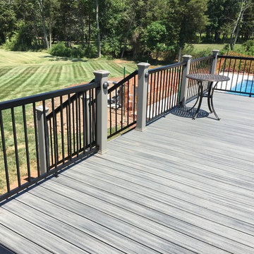 Transcend decking Island Mist with Gravel Path Rail Posts and Aluminum Railings