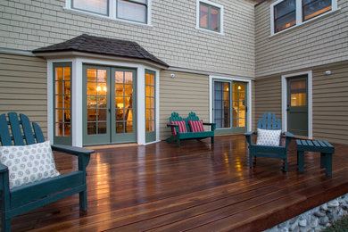 Example of a large classic backyard deck design in Los Angeles with no cover