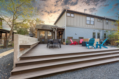 Deck - large contemporary backyard deck idea in Austin with a fire pit and no cover