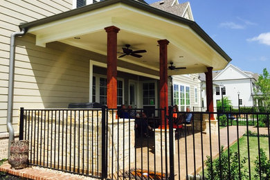 Large transitional backyard outdoor kitchen deck photo in Dallas with a roof extension
