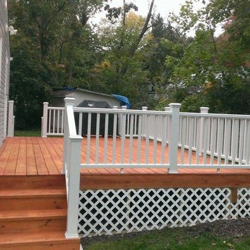 Treated decking with composite railings.