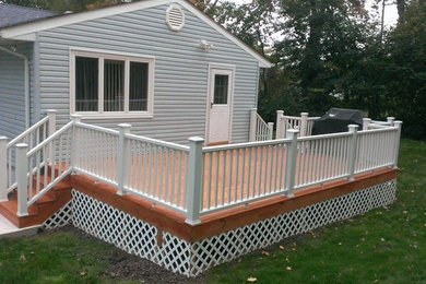 Treated decking with composite railings.