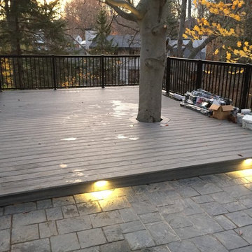 Tree in the Middle of the Deck with Staircase