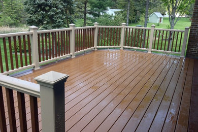 Deck - mid-sized traditional backyard deck idea in New York with no cover