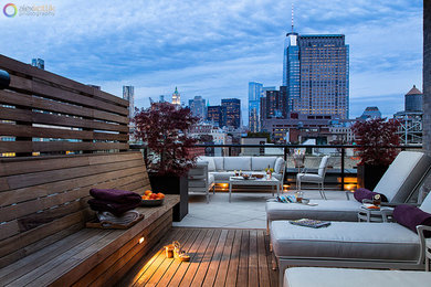Large trendy rooftop deck photo in New York