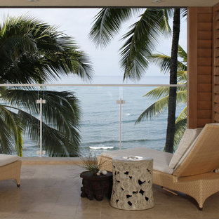 Deck - tropical deck idea in Hawaii with a roof extension