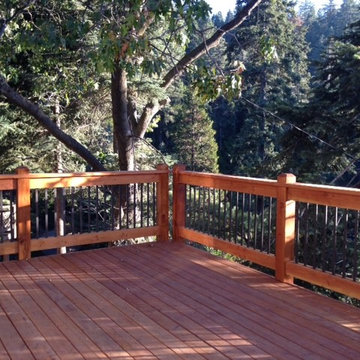 Two story wrap around deck with custom design railings