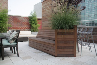 Diseño de terraza contemporánea de tamaño medio sin cubierta en azotea con jardín de macetas