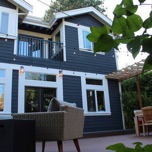 Inspiration for a mid-sized craftsman backyard deck remodel in Seattle with a fire pit and no cover