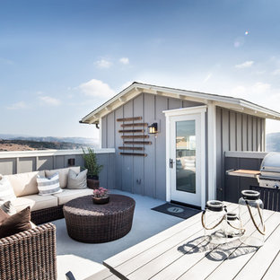 Foto di una terrazza chic sul tetto e sul tetto con nessuna copertura