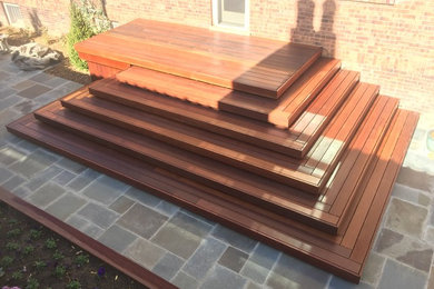 Inspiration for a mid-sized modern side yard deck remodel in Denver with no cover
