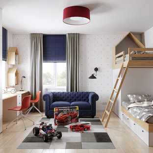 Imagen de dormitorio infantil de 4 a 10 años, actual, de tamaño medio, con suelo de madera clara, suelo beige y paredes multicolor