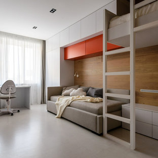 Idée de décoration pour une chambre d'enfant design avec un mur marron et un sol blanc.