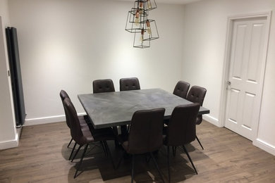 Photo of a modern dining room in Cheshire.