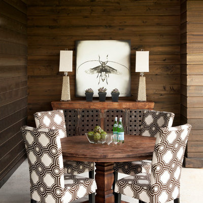 Example of a mid-sized eclectic dining room design in Other