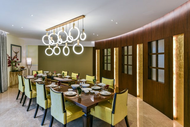Traditional Dining Room by Aum Architects