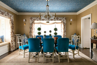 Example of an eclectic enclosed dining room design in Cedar Rapids with beige walls