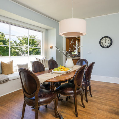 Inspiration for a timeless dining room remodel in Seattle with blue walls