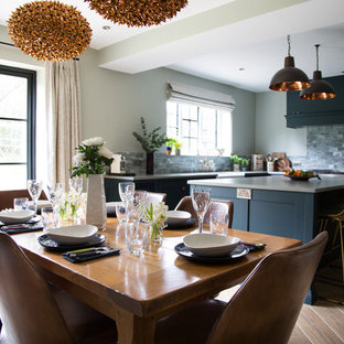 Inspiration for a classic dining room in Kent with grey walls, dark hardwood flooring and brown floors.