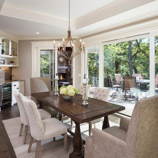 Mid-sized elegant dark wood floor and brown floor great room photo in Minneapolis with brown walls and no fireplace