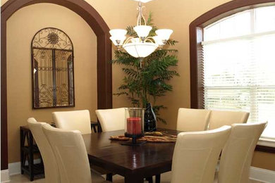 Tuscan dining room photo in Miami