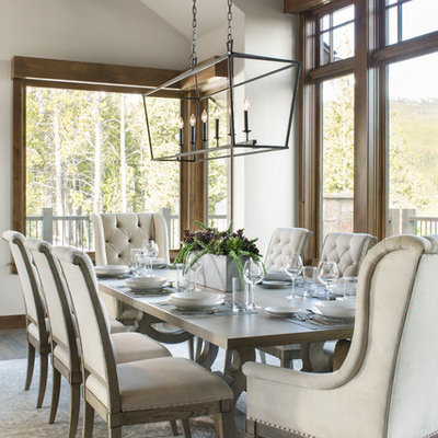 Dining room - transitional dark wood floor and brown floor dining room idea in Denver with white walls