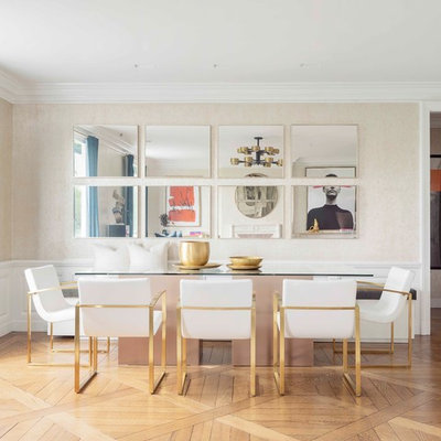 Inspiration for a contemporary medium tone wood floor and brown floor dining room remodel in New York with beige walls