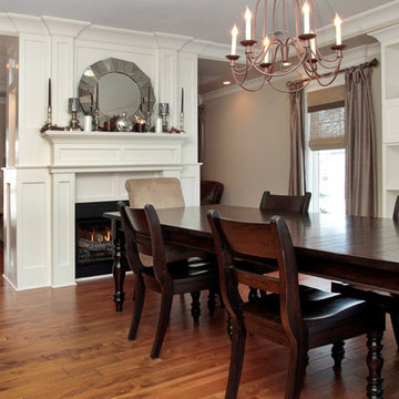 A chef's kitchen with cozy hearth room and spacious dining room
