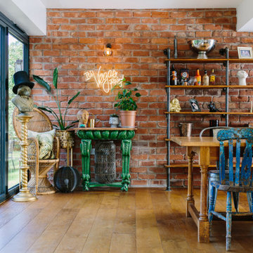 A fun and eclectic dining room with industrial shelving