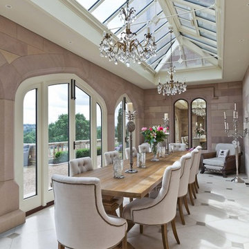 This orangery creates a classy dining room with spectacular views