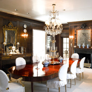Enclosed dining room - large traditional dark wood floor and brown floor enclosed dining room idea in Dallas with a standard fireplace, brown walls and a tile fireplace