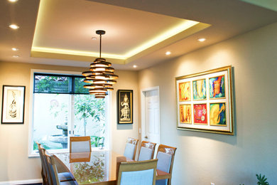 Eclectic dining room photo in San Diego with beige walls and no fireplace