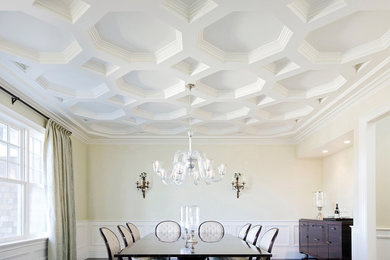 Elegant enclosed dining room photo in New York with white walls