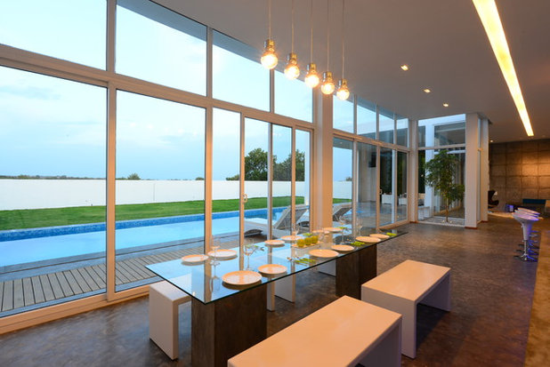 Contemporary Dining Room by Aamir and Hameeda Associates