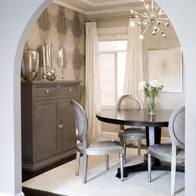 Transitional dark wood floor and brown floor enclosed dining room photo in San Francisco with gray walls