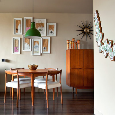 Small 1960s dark wood floor dining room photo in Melbourne with beige walls