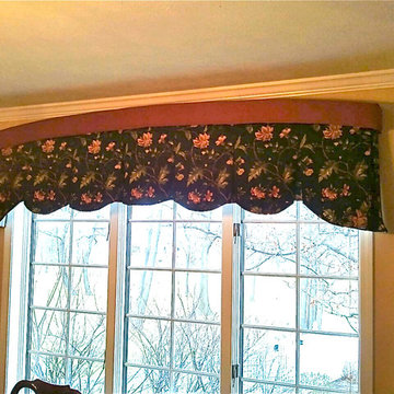 Arch cornices over inverted pleats valance
