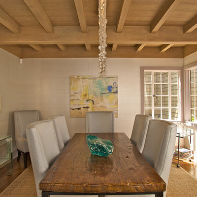 Inspiration for a contemporary medium tone wood floor dining room remodel in San Francisco with beige walls