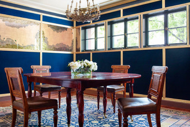 Inspiration for a timeless dining room remodel in New York with blue walls