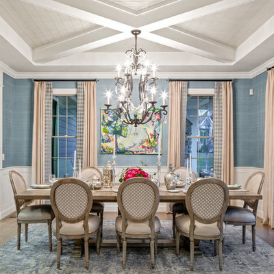 Inspiration for a transitional dark wood floor and brown floor dining room remodel in Cincinnati with blue walls