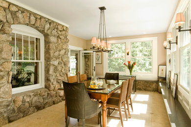 Example of a mid-sized transitional ceramic tile and beige floor enclosed dining room design in Boston with beige walls