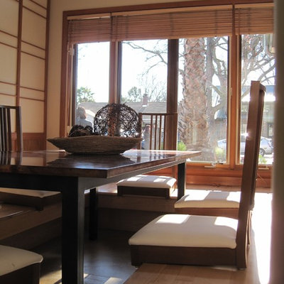 Enclosed dining room - mid-sized zen concrete floor enclosed dining room idea in San Francisco with beige walls