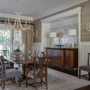 Example of a large classic dark wood floor and brown floor enclosed dining room design in San Francisco with no fireplace and beige walls