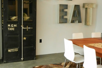Example of an urban dining room design in Los Angeles