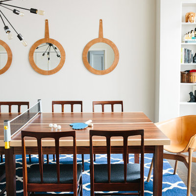 Inspiration for a mid-sized transitional great room remodel in San Francisco with white walls and no fireplace