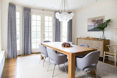 Example of a transitional dining room design in Boston