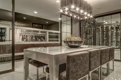 Example of a large trendy gray floor and ceramic tile enclosed dining room design in Calgary with gray walls