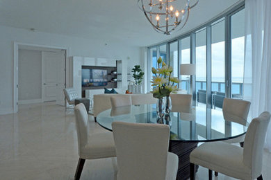 Example of a mid-sized transitional white floor great room design in San Diego with white walls