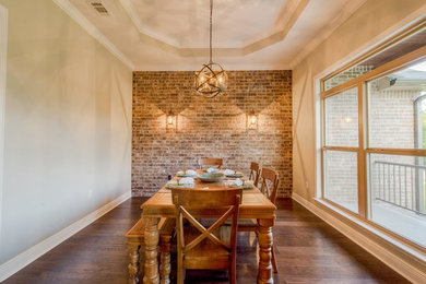 Inspiration for a mid-sized transitional dark wood floor enclosed dining room remodel in Miami with beige walls and no fireplace