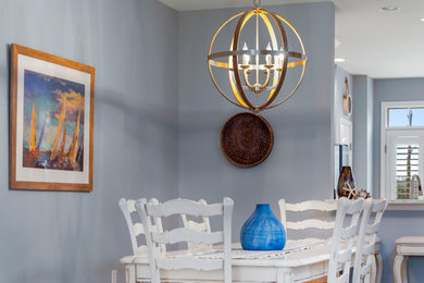 Beach style dining room photo in Other